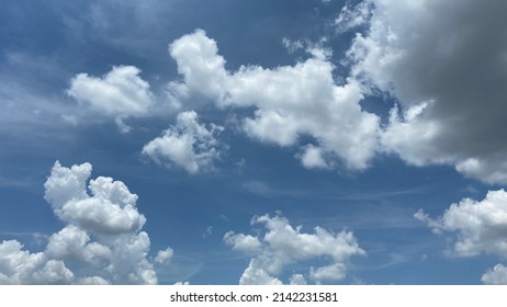 Blue Sky And Cloud Natural Background, Big White Fluffy Clouds In The Blue Sky And Blue Sky With Cloud Close Up.