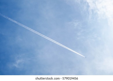 Blue Sky With Cloud In The Sunny Day With Airplane Contrail As A Long Line.