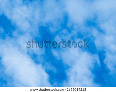 Blue sky with clouds background texture. Sky scape.