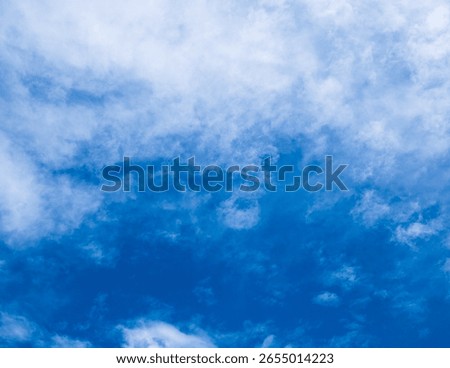 Blue sky with clouds background texture. Sky scape.