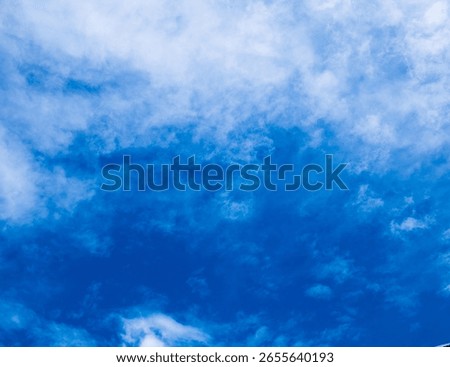 Blue sky with clouds background texture. Sky scape.