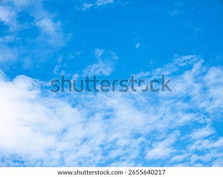 Blue sky with clouds background texture. Sky scape.