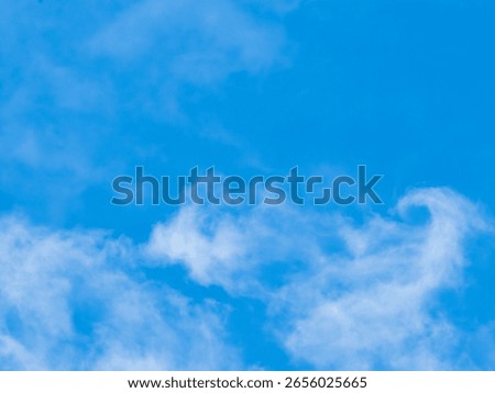 Blue sky with clouds background texture. Sky scape.
