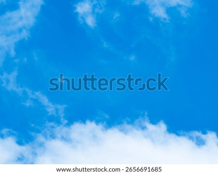 Blue sky with clouds background texture. Sky scape.