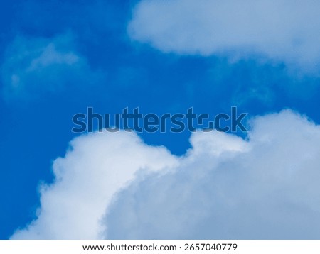 Blue sky with clouds background texture. Sky scape.