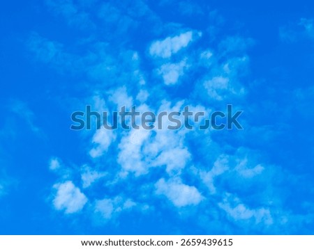 Blue sky with clouds background texture. Sky scape.