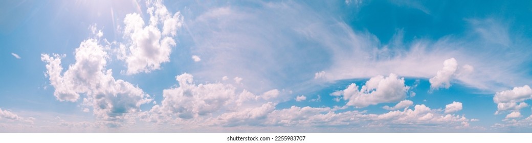 Blue sky with clouds. Cloudy sky background. Horizontal banner