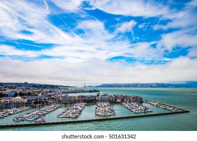 Blue Sky with Clouds and Fog Over the Golden Gate Bridge and the San Francisco Bay Pier 39 and Fisherman's Wharf