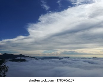 Blue Sky With Clouds And Mountains Trees