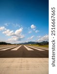 Blue sky and clouds seen from the airplane runway