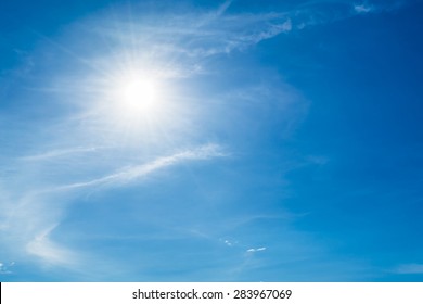 Blue Sky With Clouds And Sun