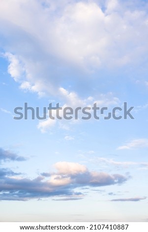Blue sky with clouds in sunlight. Background or template