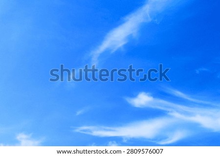 Blue Sky with Diagonal Cloud Streak