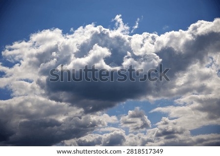 blue sky with fluffy clouds background