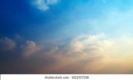 Blue sky and fluffy clouds with copy space,  Evening sky background, Beautiful cloudscape background