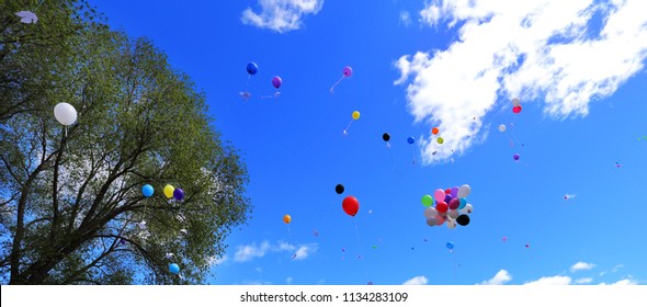 In The Blue Sky Flying Balls Of Fate. At The Celebration In Honor Of The End Of The School Year.