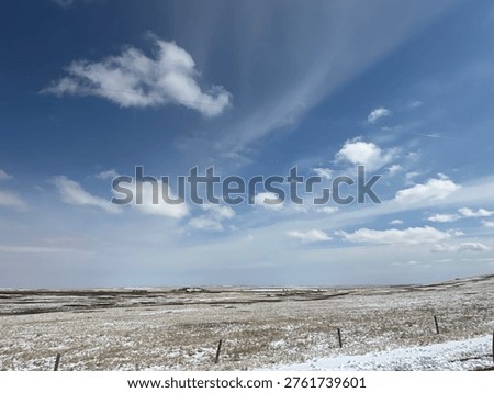 Blue sky with gentle cloud coverage