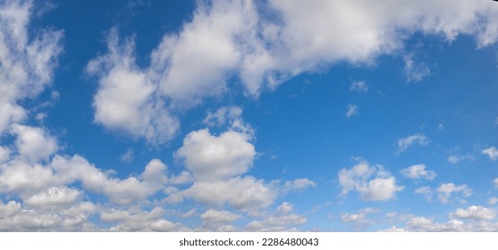 Blue sky with gray clouds at daytime - Shutterstock ID 2286480043