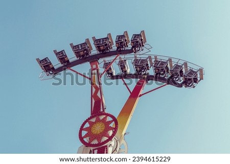 Blue sky and kamikaze in the amusement park