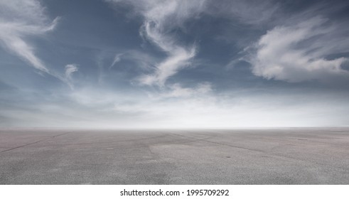 Blue Sky Landscape Background with Nice Clouds and Empty Concrete Floor - Shutterstock ID 1995709292