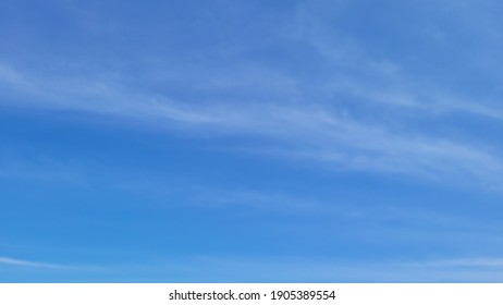 blue sky with light cloud background