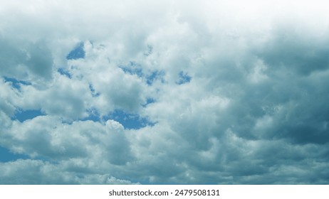 Blue Sky with Many Dark Clouds,Blue Sky, Dark Clouds, Storm Clouds, Cloudy Sky, Overcast, Weather, Nature, - Powered by Shutterstock