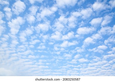 Blue sky with multitude small clouds , may be used as background or texture - Shutterstock ID 2083250587