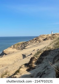 Blue Sky And Ocean With The Old Light House In Denmark