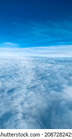 Blue sky on top of clouds.