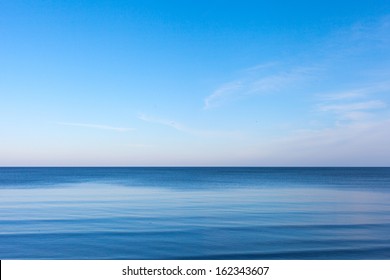 Blue sky over blue Baltic sea.