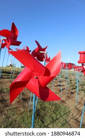 Blue Sky And Red Pinwheel