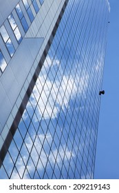 The Blue Sky Reflected In The Skyscraper