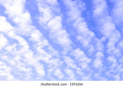 blue sky with scattered clouds