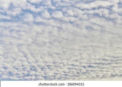 Blue Sky With Some White Puffy Clouds  