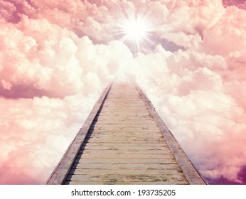 Blue sky with sun and beautiful clouds. Stairs in sky, the road to heaven. Purple toning - Shutterstock ID 193735205
