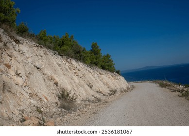 blue sky, blue sunny sky, green bushes, green mountain landscape, green mountains, green mountains blue sky, mountains and sky, mountains and trees, rocky landscape, stones, summer, summer background, - Powered by Shutterstock