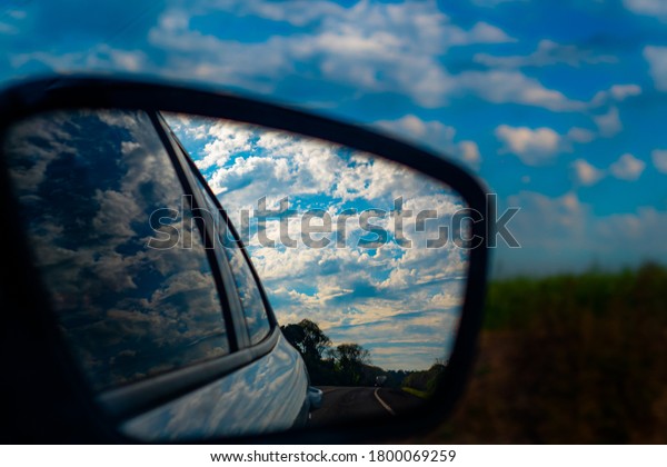 
Blue sky view from
the car's rear view