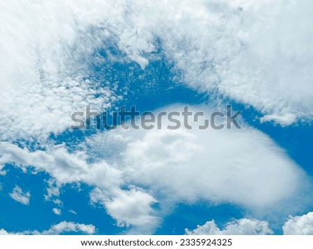 Blue sky wallpaper with clouds in different shapes. Medellin, Antioquia, Colombia. 