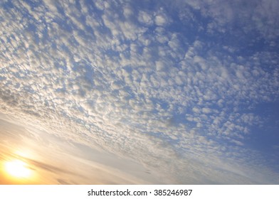 Blue sky with the wavy clouds