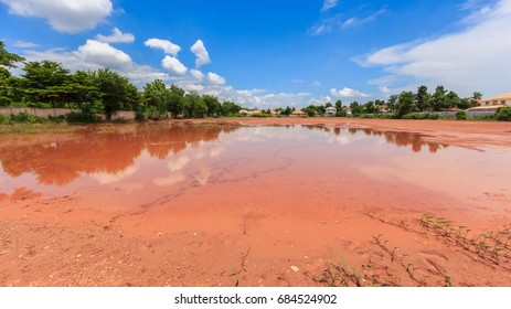 blue sky white cloud clear weather with village background and tree shadow reflect with wafer