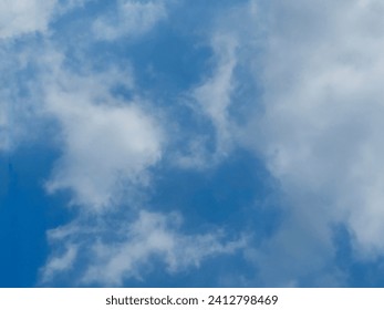 Blue sky with white cloud and plane fying in the middle, The passenger airplane is flying far away in the blue sky and white clouds. Aircraft in the air. International passenger air transportation. 