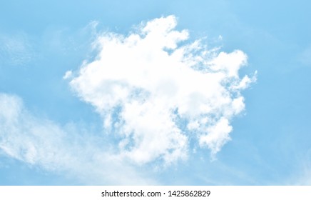 Blue sky with white clouds. Beautiful sky background and wallpaper. Clear day and good weather in the morning.   - Shutterstock ID 1425862829