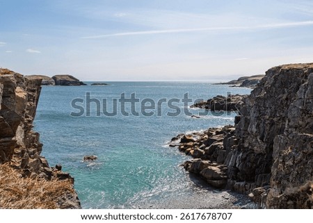 Blue sky, white clouds, calm sea. There is no Puffin's Puffin Viewing Site yet, the scenery of the bay. -Elliston, Newfoundland and Labrador, Canada. 
