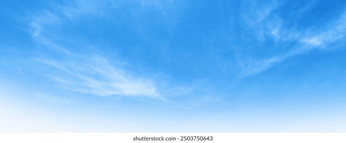 blue sky with white clouds. The sky is clear and bright, and the clouds are scattered throughout the sky. Scene is peaceful and serene, as if the viewer is looking up at a beautiful day - Powered by Shutterstock