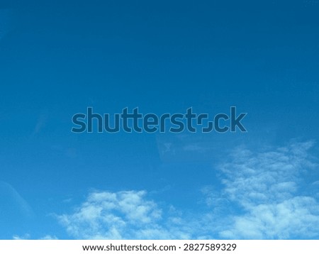 Blue Sky With White Clouds Creating a Bright Natural Background and Peaceful Atmospheric Scene