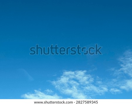 Blue Sky With White Clouds Creating a Bright Natural Background and Peaceful Atmospheric Scene