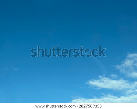 Blue Sky With White Clouds Creating a Bright Natural Background and Peaceful Atmospheric Scene
