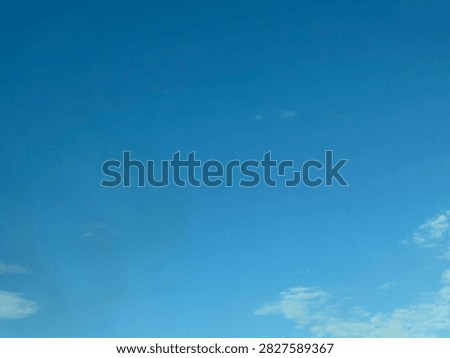 Blue Sky With White Clouds Creating a Bright Natural Background and Peaceful Atmospheric Scene