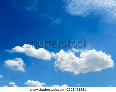 Blue sky and white clouds. Daytime sky. Sky background
tacked stone brick wall. Stone cladding wall made of striped stacked slabs of natural grey rocks. Panels for exterior. pattern of decorative