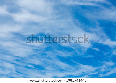 Blue sky and white clouds during summer time.